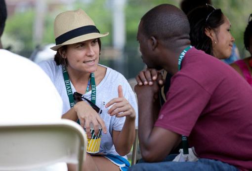 An international meeting of young minds - Rebecca Hodes, deputy director of the Centre for Social
Science Research’s AIDS and Society Research Unit at the University of
Cape Town in South Africa, converses with a colleague during the BIARI Global Health Institute at Brown University.Photos by Rythum Vinoben
