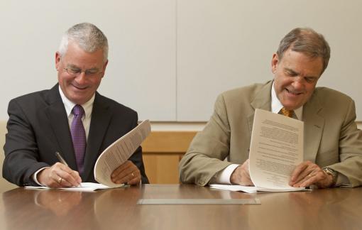 A new, stronger, strategic affiliation agreement - Dennis D. Keefe, left, president and CEO of Care New England, and Dr. Edward Wing, dean of medicine and biological sciences at Brown, signed a new affiliation agreement that strengthens ties and strategic planning among the school and Women & Infants Hospital and Butler Hospital.