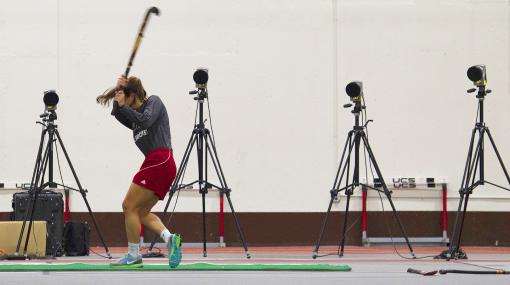 The biomechanics of a good swing - An array of four high-speed cameras records whack after whack on 11
different field hockey balls. Motion markers — bits of tape on the balls,
sticks and players’ hips — documents the shot and follow-through.