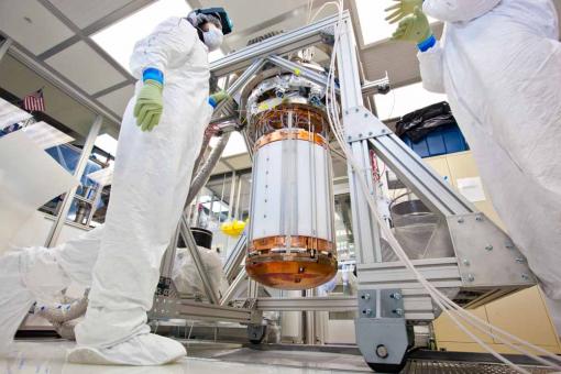 How to catch a WIMP - Photomultiplier tubes capable of detecting a single photon of light line the top and bottom of the LUX dark matter detector. They will record the position and intensity of collisions between dark matter particles and xenon nuclei.