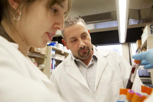 A marker for toxic exposures - Carmen Marsit, with lab assistant Alison Migliori, hopes methylation patterns can be effective in prediction or diagnosis of bladder and other cancers.