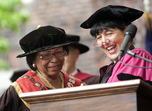 The Susan Colver Rosenberger Medal - President Ruth J. Simmons listens as Cynthia Garcia Coll, chair of the faculty and the Faculty Executive Committee, reads the citation presenting her with the faculty’s highest honor.