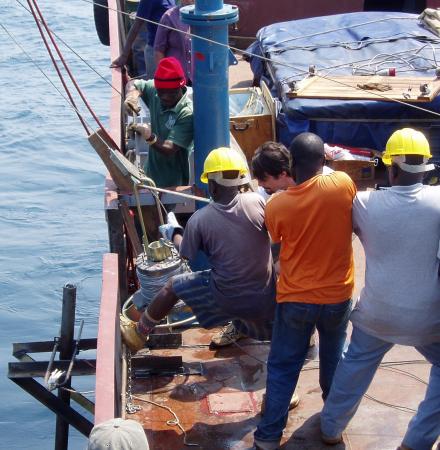 Warming Lake - Researchers drilled cores into Lake Tanganyika to document the lake’s surface temperature for the last 1,500 years. They found unprecedented warming in the 20th century. Brown geologist James Russell, kneeling at drill head, led this core sampling mission in 2004.