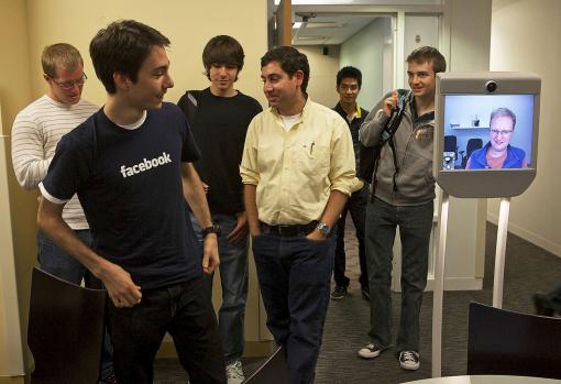 Live and virtually interactive - Software developer Josh Tyler moved around via telepresence robot, looked at surroundings, conversed, and participated in a session at Brown University without leaving California.
