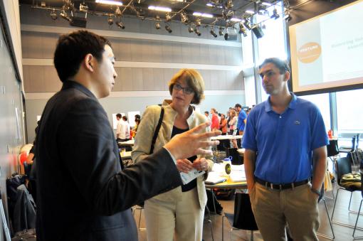 “Take some risks and do something different” - President Christina Paxson chats with Venture for America founder Andrew Yang, left, and VfA board member Charlie Kroll, both Brown alums. This year’s VfA “boot camp” is launching 68 apprenticed entrepreneurs, 13 of them in Providence.