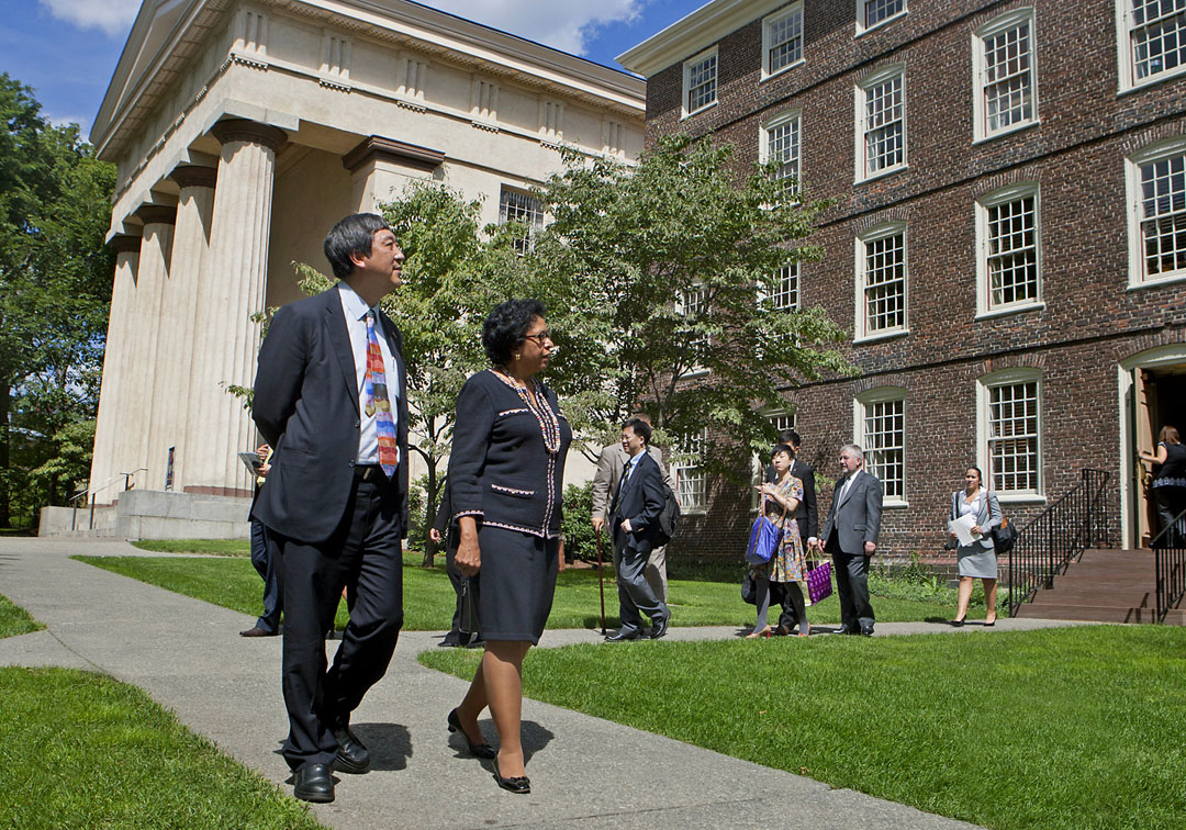 Celebrating stronger institutional ties: Presidents Simmons and Sung stroll on the Front Green after a formal signing ceremony in the President’s Office. Credit: Mike Cohea/Brown University