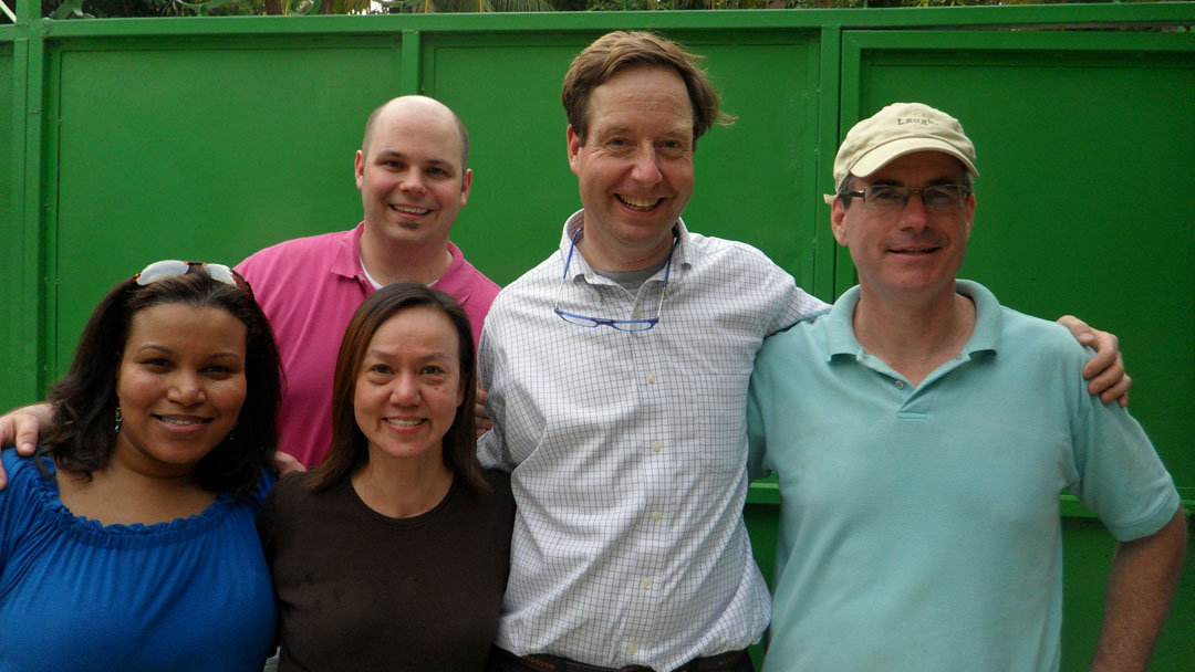 The importance of being there: Brown’s physician team includes, from left, Sybil Cineas, Michael Koster, Susan Cu-Uvin, and Tim Flanigan. Patrick Moynihan, right, a Brown alumnus, is president of The Haitian Project.