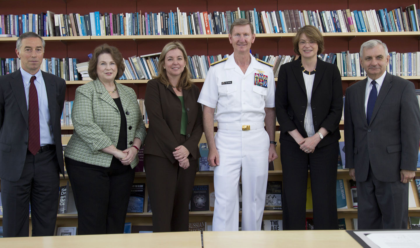 At the signing: From left, Richard Locke, Watson Institute director; Mary Ann Peters, provost of the Naval War College; Vicki Colvin, provost-elect at Brown; Rear Admiral Carter; President Paxson; Sen. Jack Reed.
