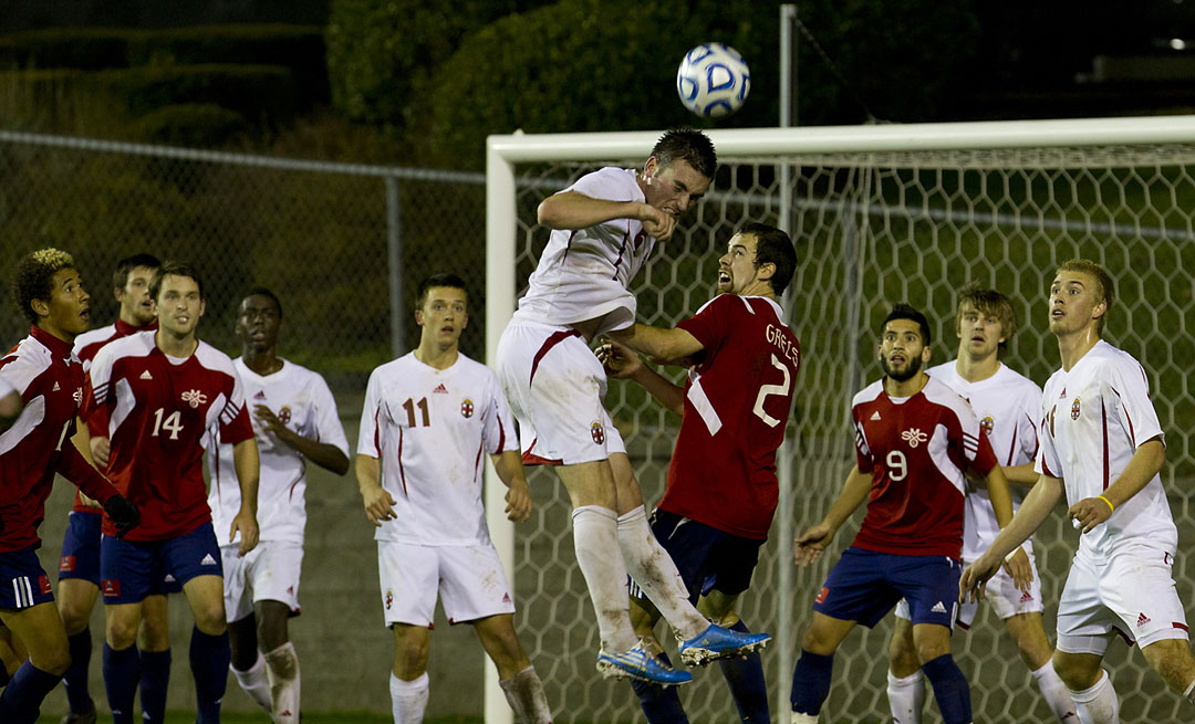 Out of harm’s way: Ryan McDuff heads the ball out of trouble during a Saint Mary's corner kick.