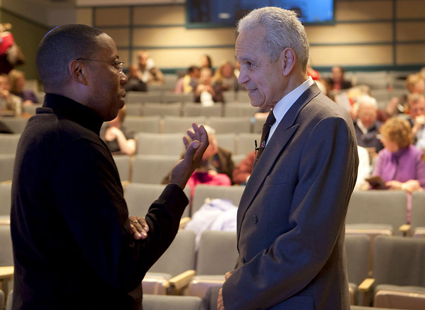 Discrimination in health care is unethical, inhumane: White speaks with Gary Johnson, clinical associate professor of neurology, prior to his address.&nbsp;&nbsp;&nbsp;Credit: Mike Cohea/Brown University
