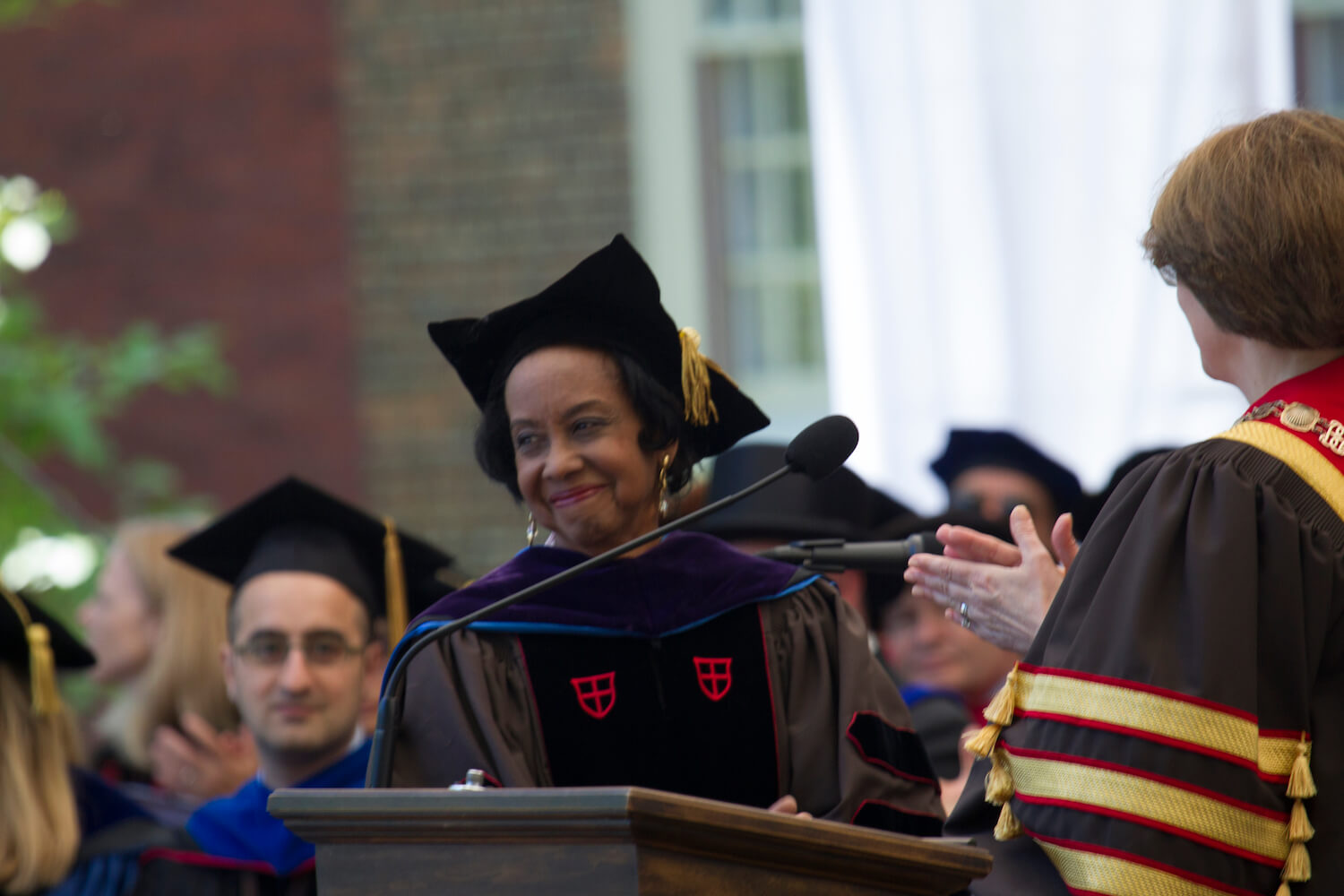 Beverly Ledbetter receives a posthumous honorary doctorate on behalf of Beatrice Coleman at Brown Commencement 2014.