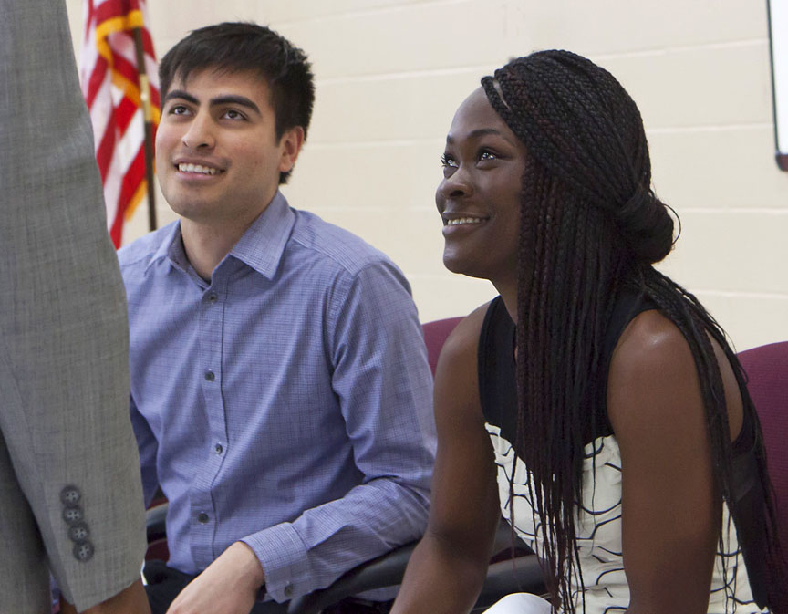 A college coach: Julio Reyes, a College Advising Corps member at Alvarez, and graduating senior Decontee Roberts enjoy the moment. She's headed to Clark University in pre-med.