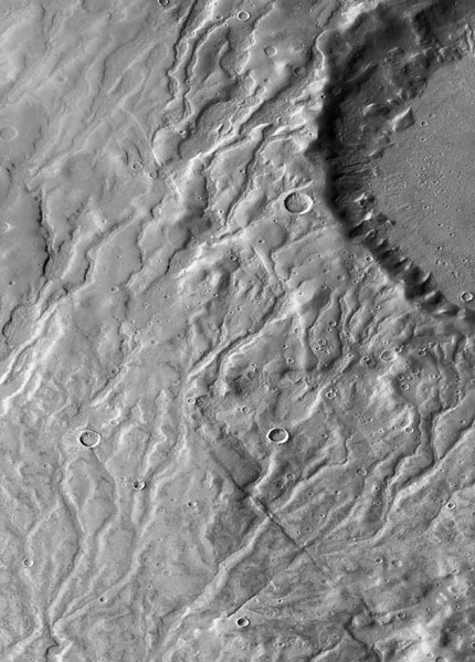 From Mars Reconnaissance Orbiter: Additional modeling might determine how fast Martian snow could have melted and whether snowmelt alone could have carved the valleys.