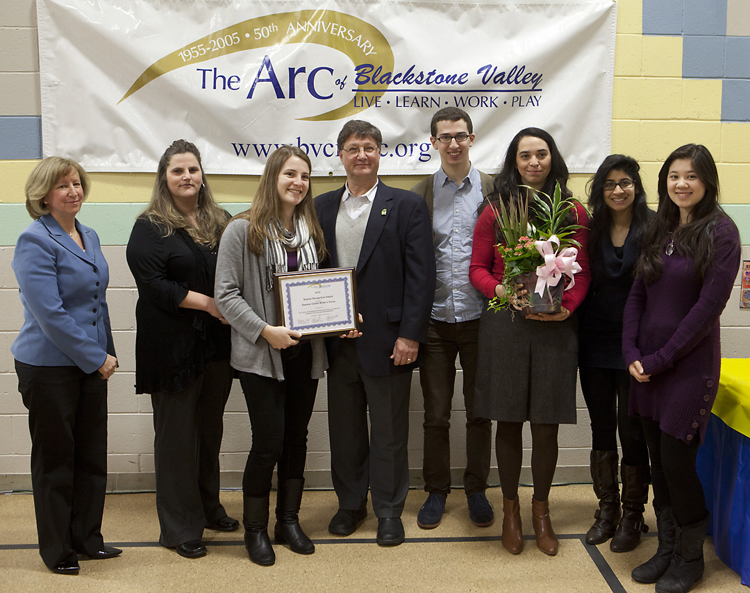 Writers’ Group: From left: Kathy Hunt, chief operating officer at Arc of Blackstone Valley; Michelle Rattray, a staff member at Blackstone Valley Industries; Kate Carbone, a Brown student; Rabbi Alan Flam, director of advising and community collaborations at the Swearer Center; and Brown students Adam Davis, Gaby Scarritt, Riana Dutt, and Leah Bromberg.Credit: Brown University