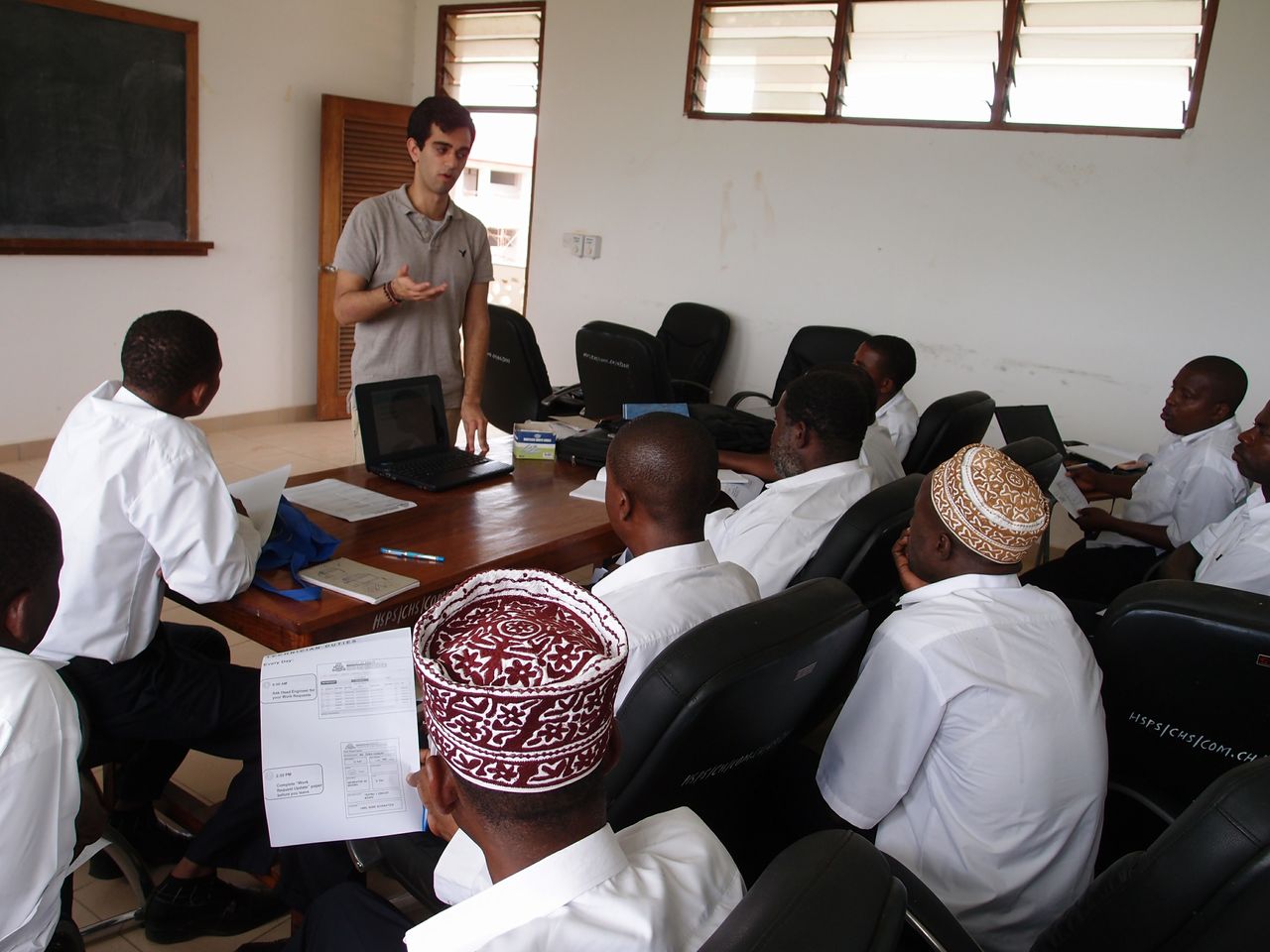 Developing expertise: Marwaha teaches hospital personnel about the hospital’s new software system that will help manage equipment repairs.