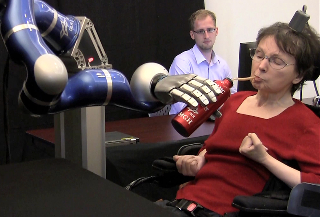 People with paralysis control robotic arms using brain-computer interface
