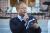 Eric Estes, vice president for campus life and student services, reads a poem by Kazim Ali.