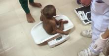 A baby on a scale